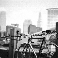 Custom aluminum frame with a flat black powder coat. Phil Wood hubs of course. Used it for messengering in Cleveland. It’s got a ton of battle scars from over the years and still one of my favorite bikes.