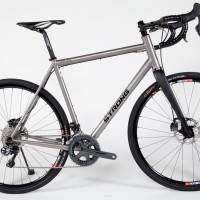 Titanium gravel bike with Shimano Di2 and hydro brakes.