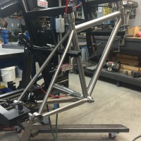 Custom Blend titanium gravel bike. Flat mount brake and internal brake routing.