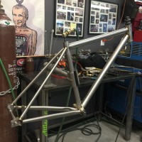 Custom Blend titanium gravel bike. Flat mount brake and internal brake routing.