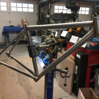 Custom Blend titanium gravel bike. Flat mount brake and internal brake routing.