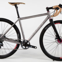 Titanium gravel bike with Sram Force 1 and flat mount brakes.